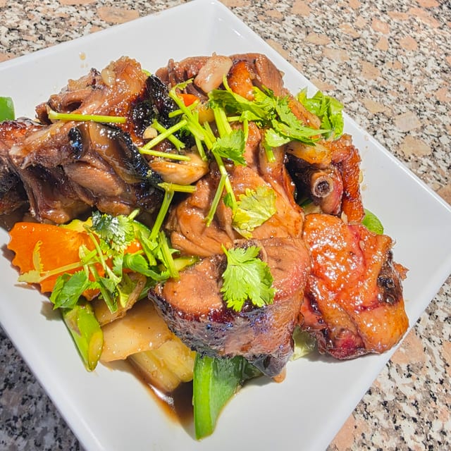 Asian Roast Duck with Chef's Sauce & Rice.